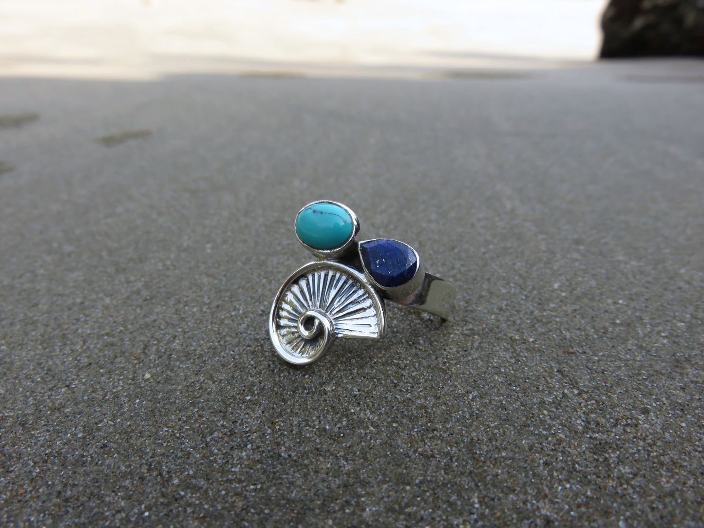 Ring with snail and stones made of silver