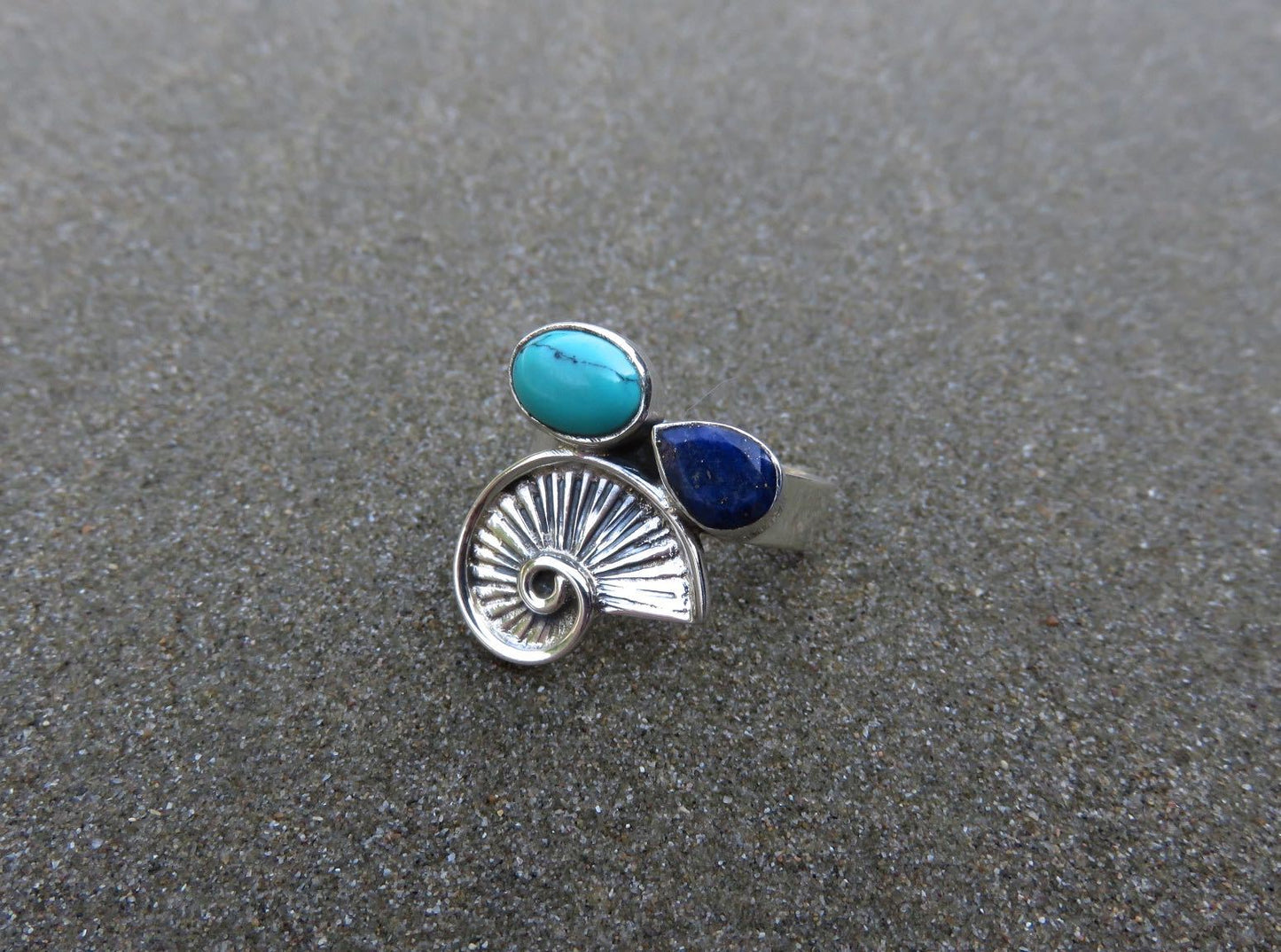 Ring with snail and stones made of silver