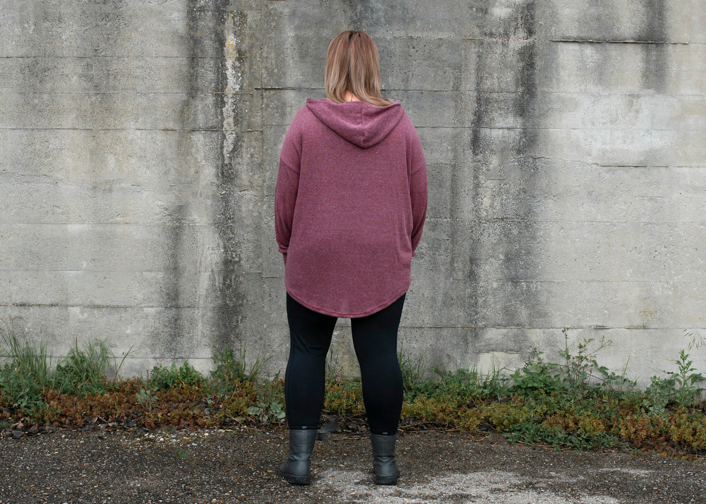 PLUS SIZE, long, plain knitted sweater with a large hood and thumbholes in red