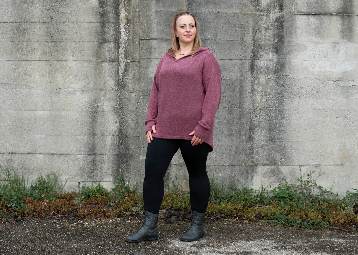 PLUS SIZE, long, plain knitted sweater with a large hood and thumbholes in red
