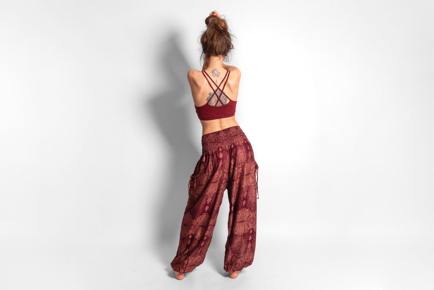 Yoga top with the pattern of the flower of life red