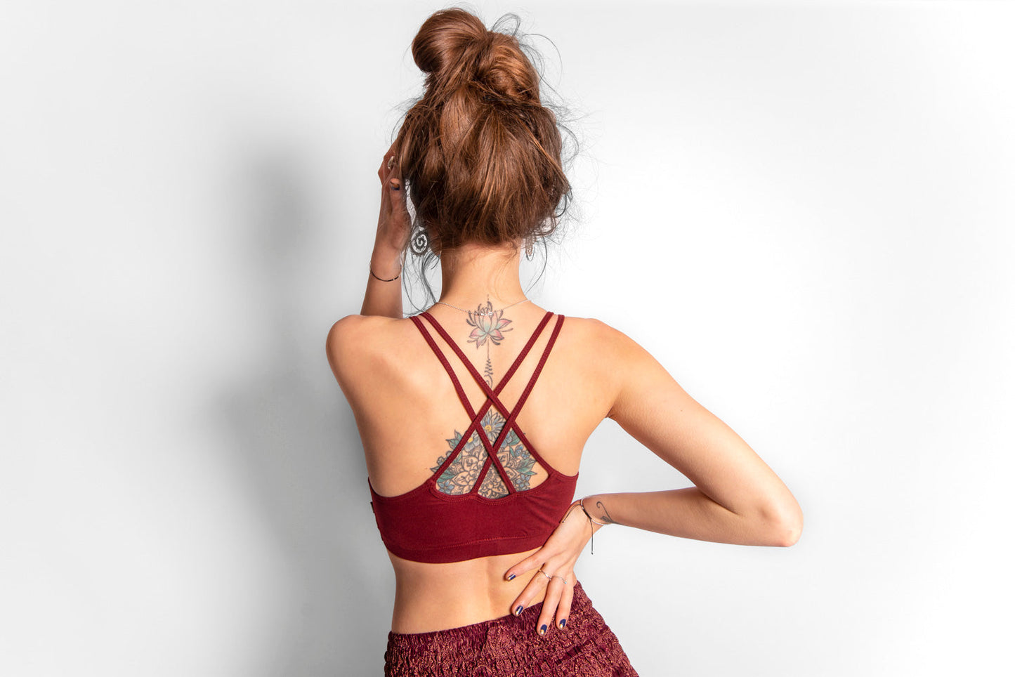 Yoga top with the pattern of the flower of life red