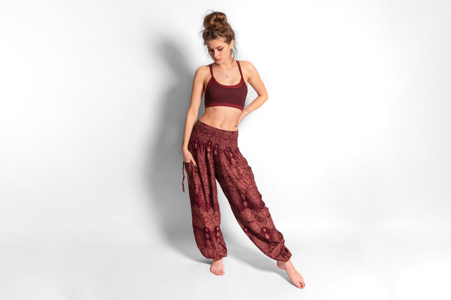 Yoga top with the pattern of the flower of life red