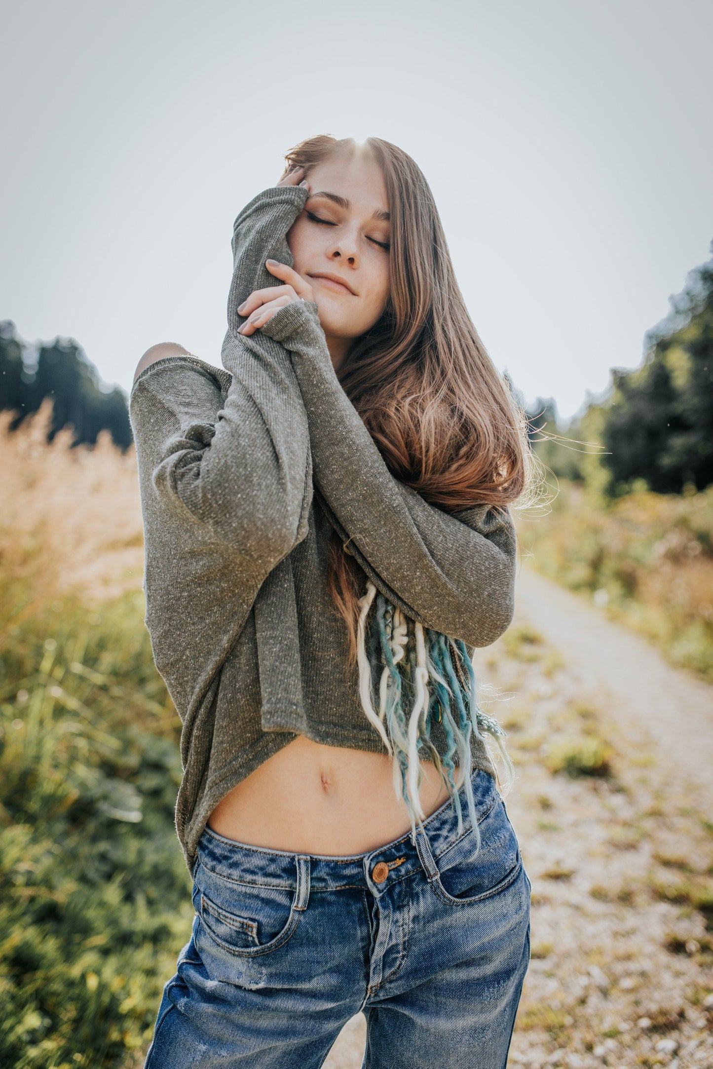 half-length, loose knitted top in kaki green