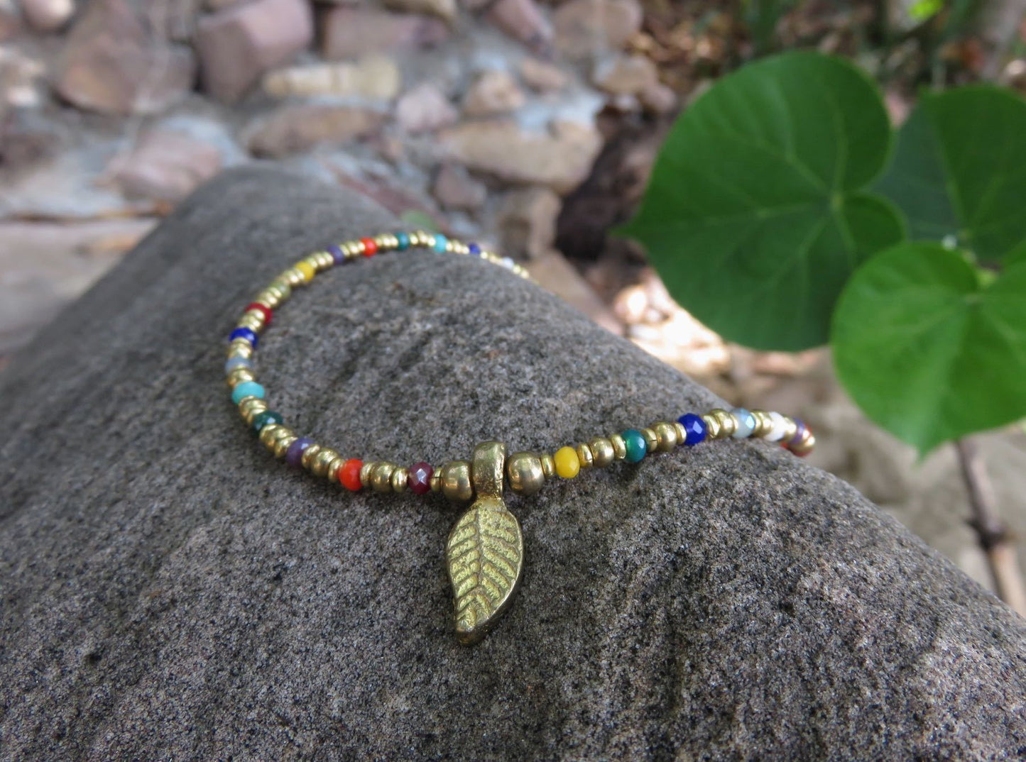 colorful anklet with a small leaf made of brass