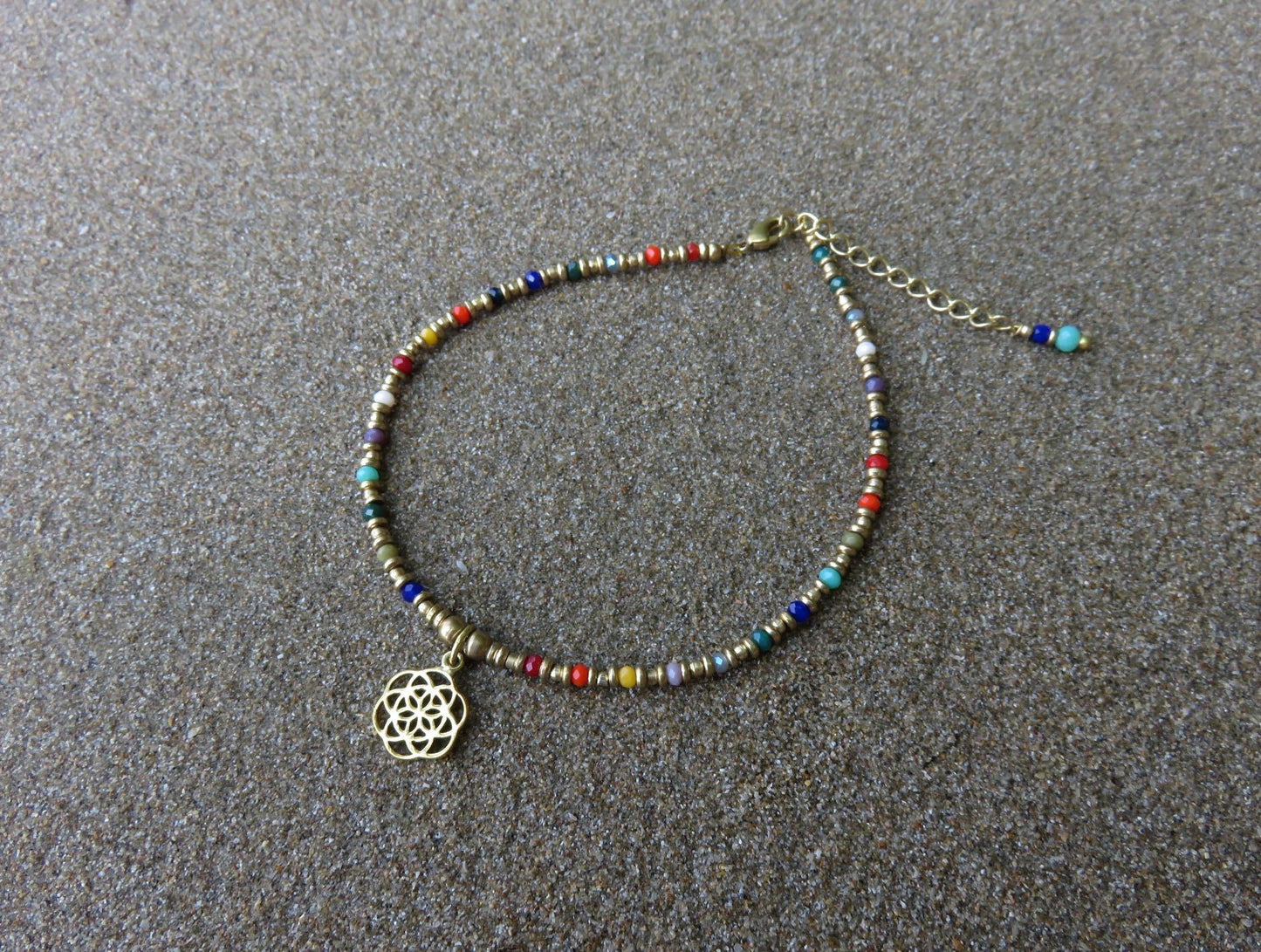 colorful anklet with flower pendant made of brass