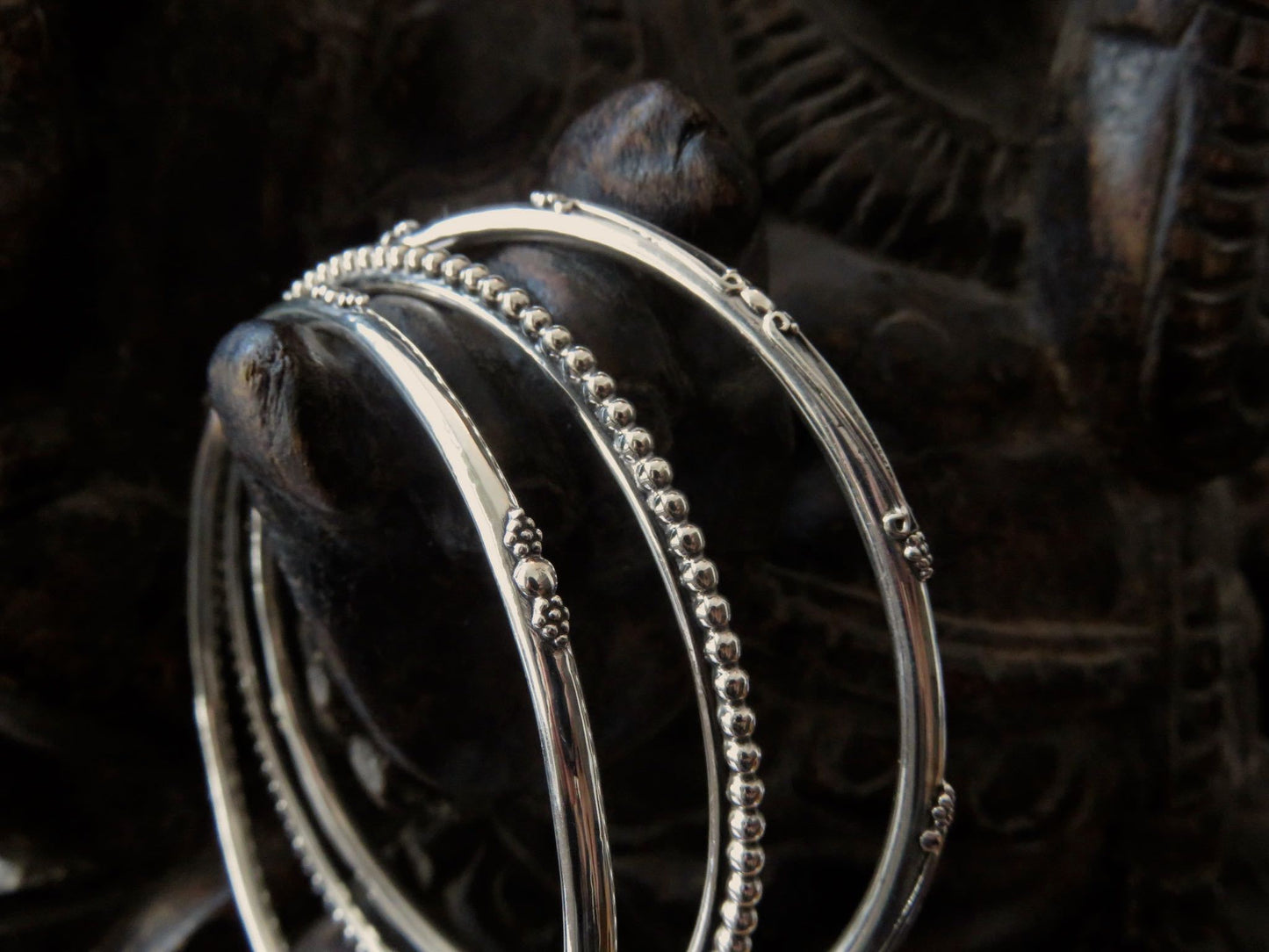 Set of three decorated silver bangles