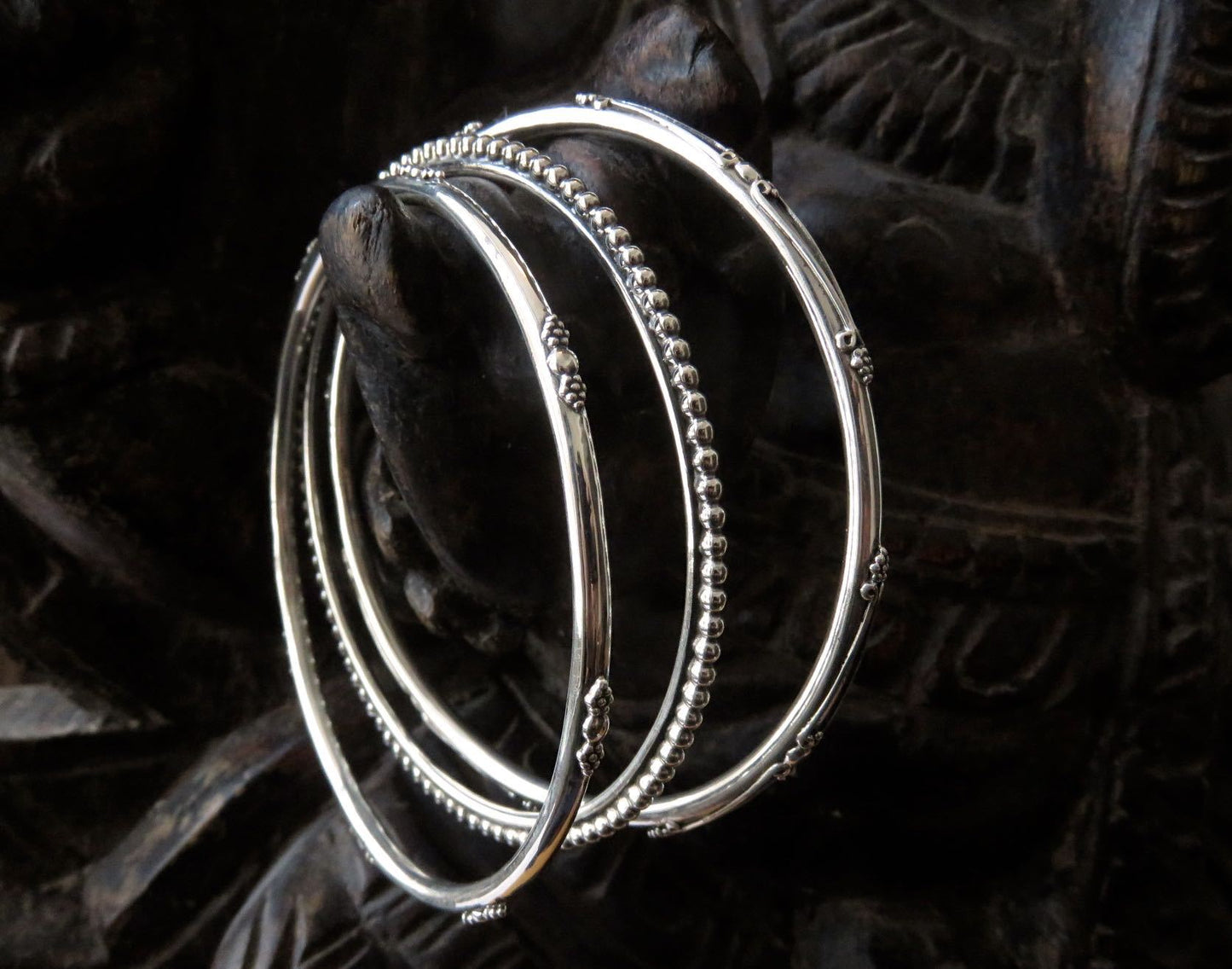 Set of three decorated silver bangles