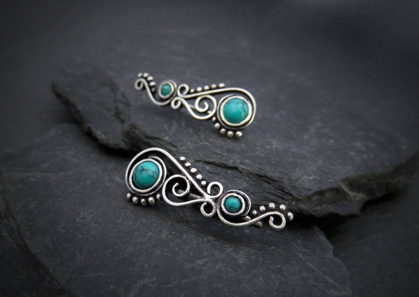 Earclimber earrings with turquoise stones made of silver