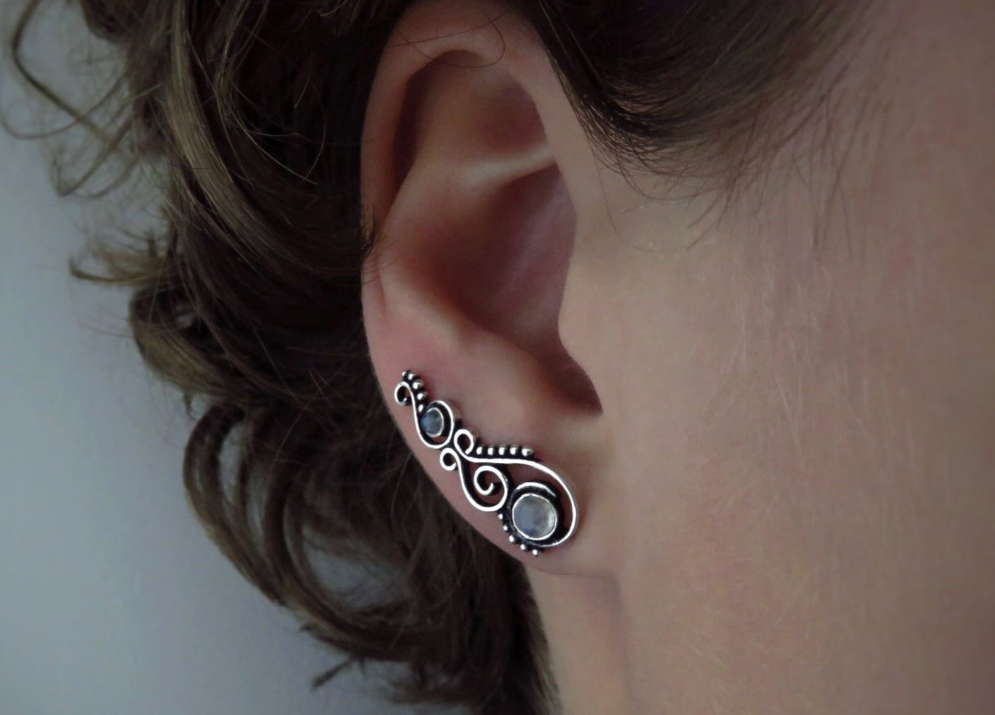 Earclimber earrings with rainbow moonstones made of silver