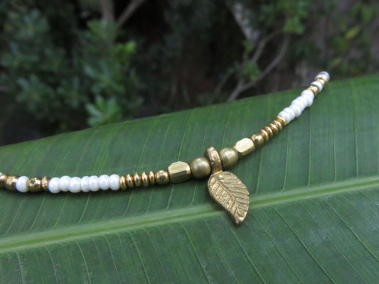 Anklet with small brass leaf and colored beads