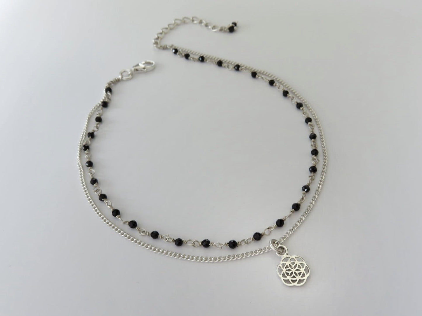 double row silver anklet with small pendant and spinel stones