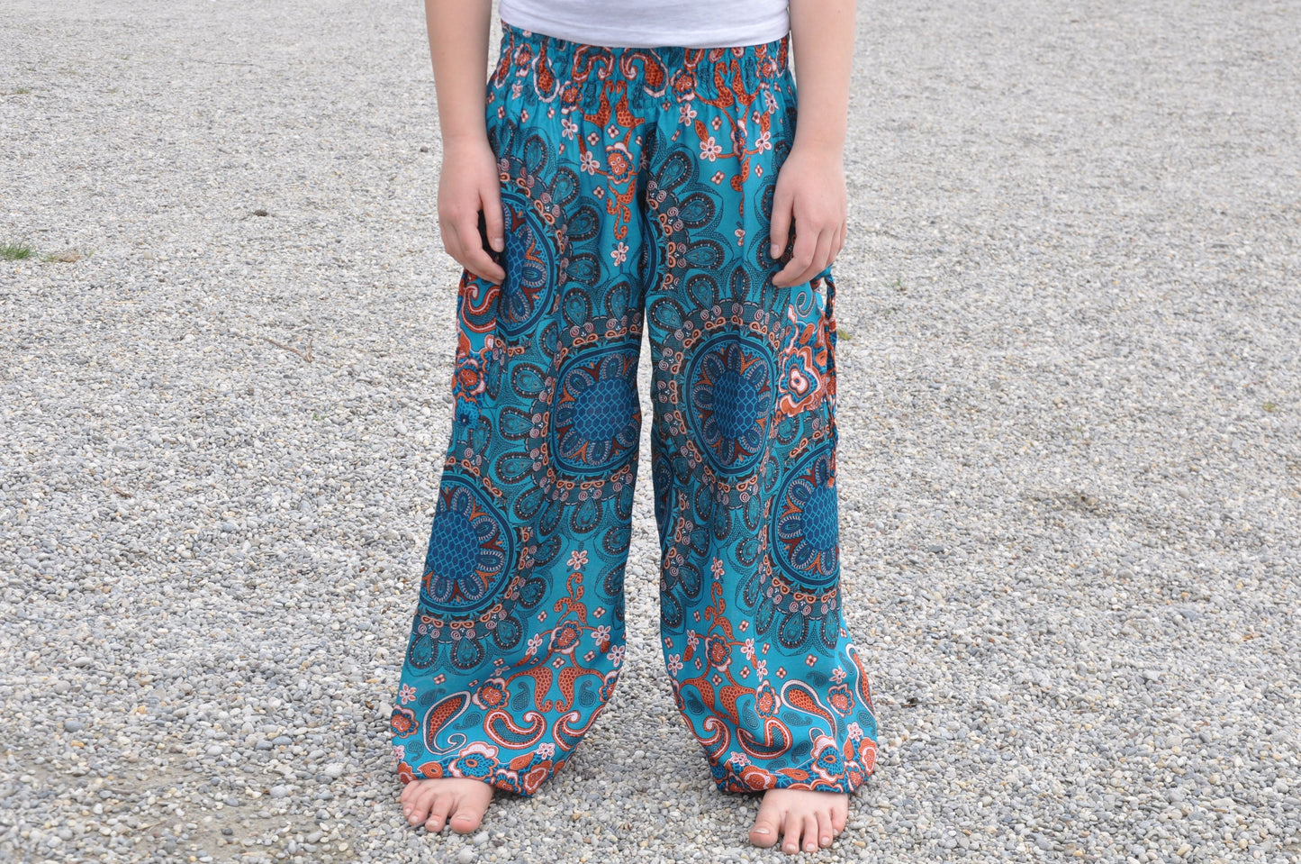 türkis orange gemusterte Pluderhose für Kinder