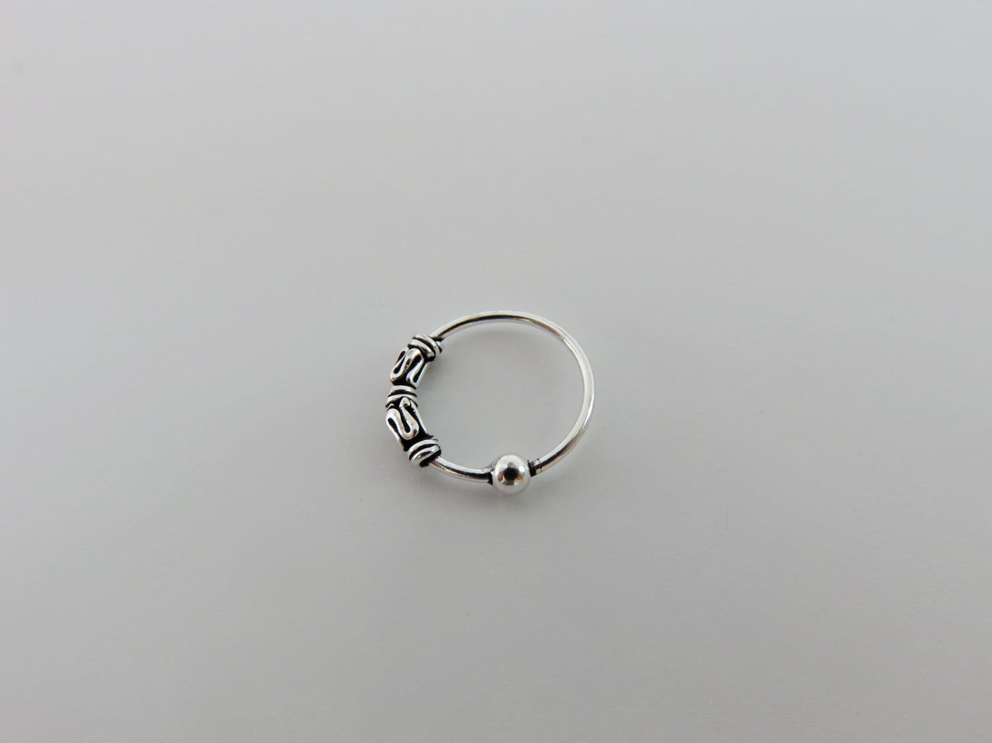 Silver nose ring