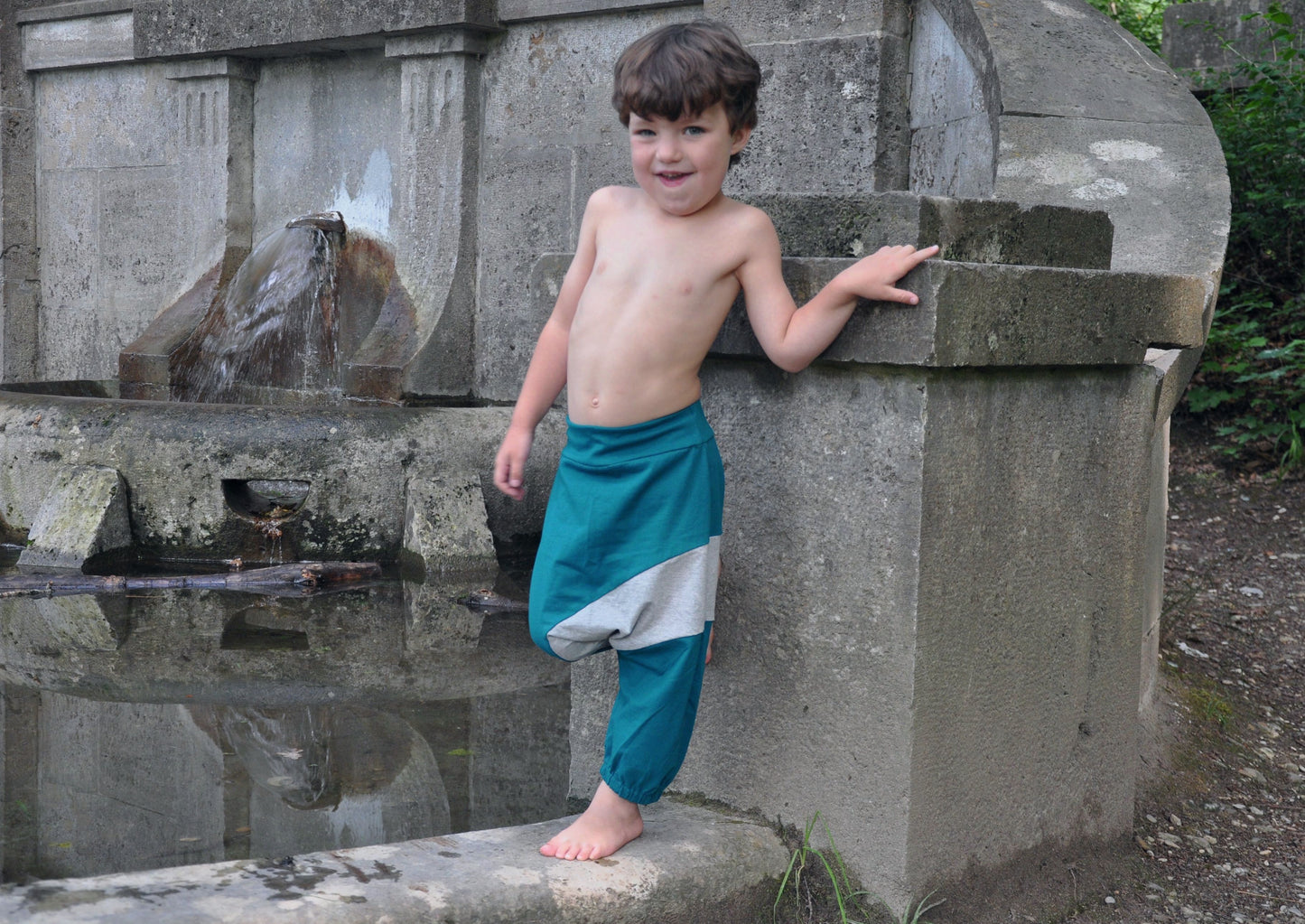 bequeme Sweat Hose für Kinder in türkis grau