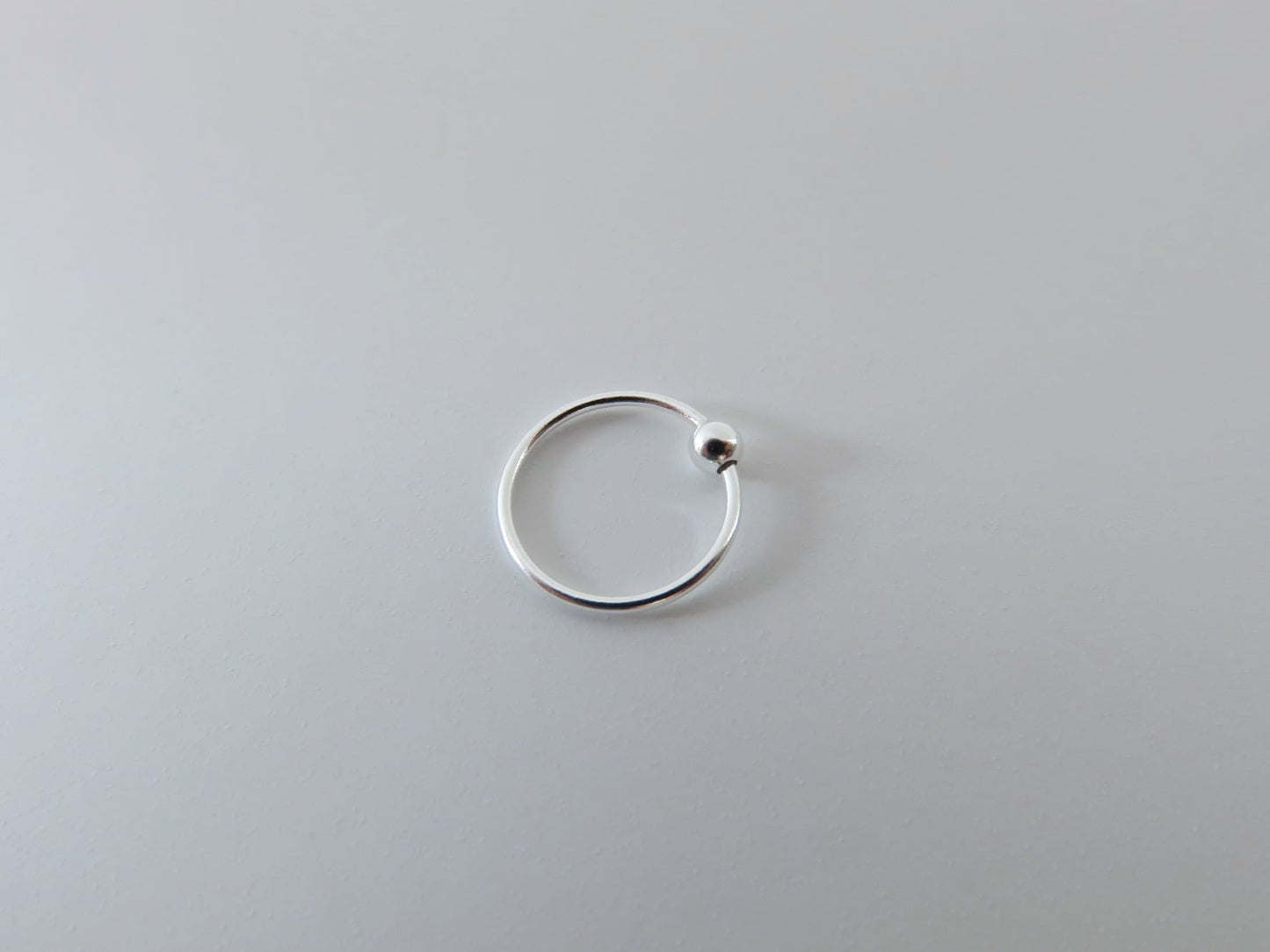 Silver nose ring