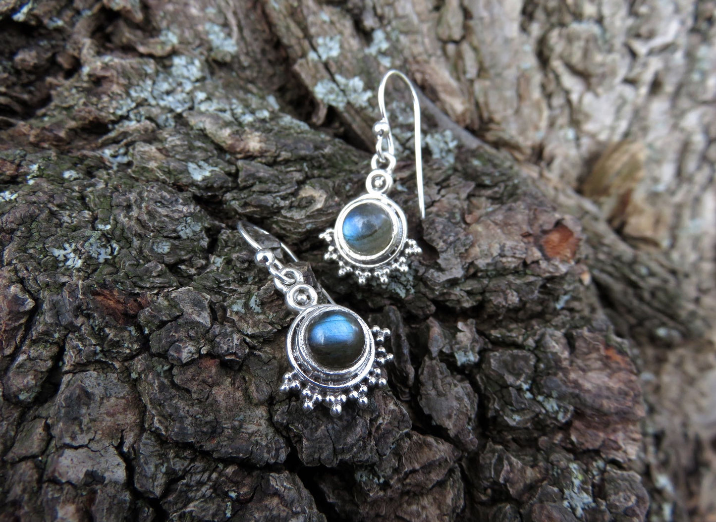 small earrings made of silver with stone and dots