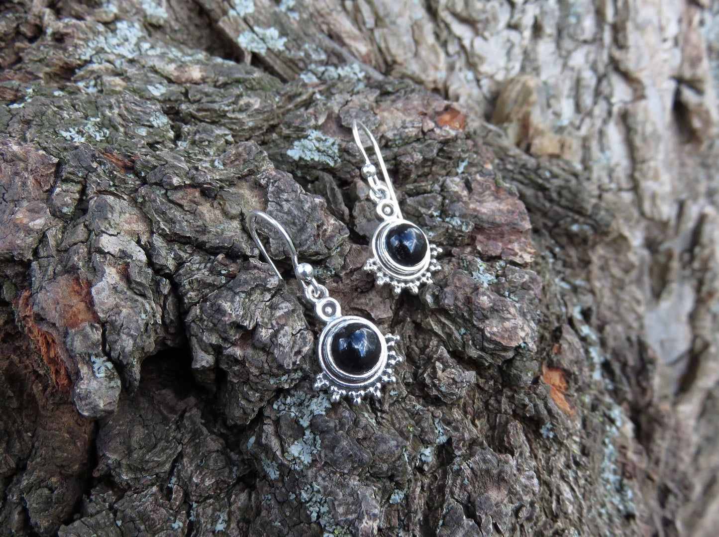 small earrings made of silver with stone and dots