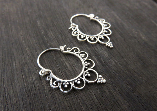 small hoop earrings with circles and dots made of silver