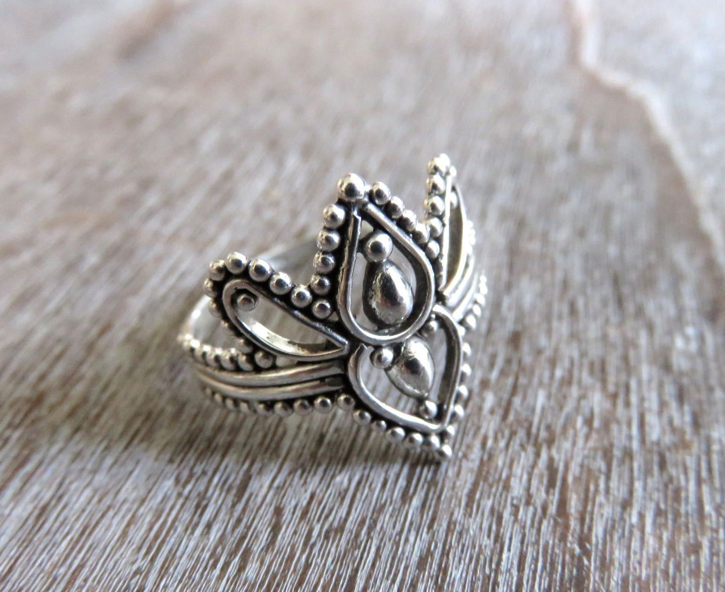 playful ring decorated with silver dots