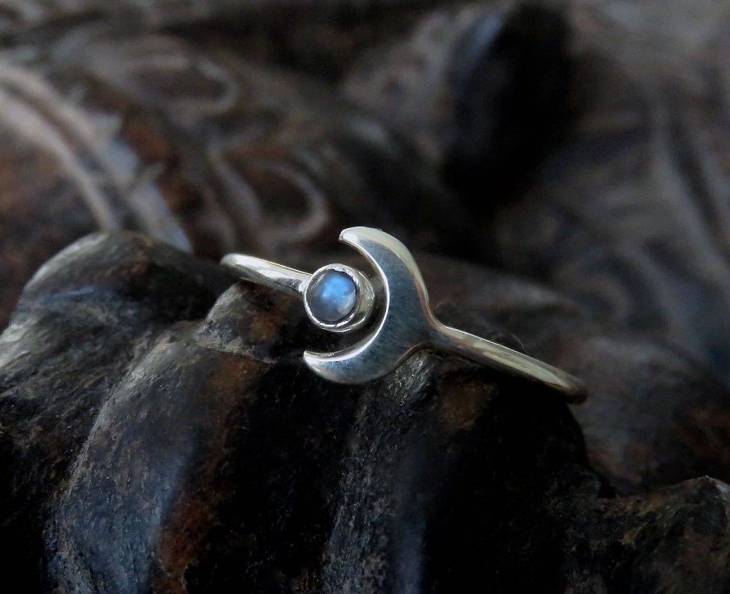 Ring with small stone and moon made of silver