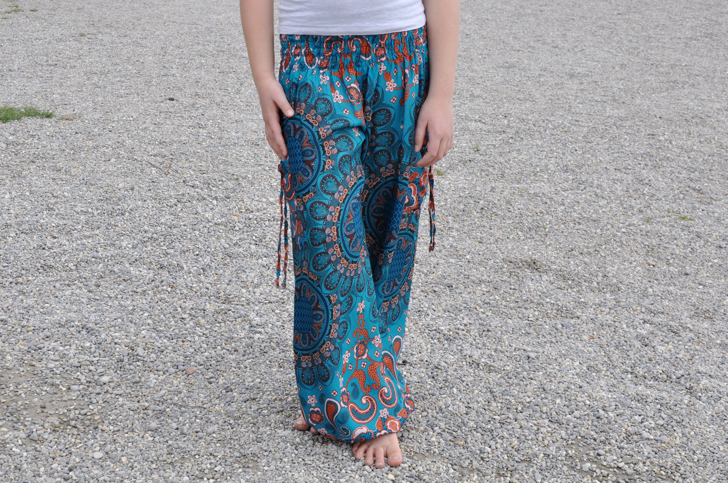 türkis orange gemusterte Pluderhose für Kinder