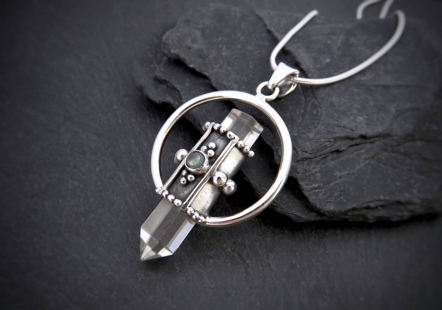 Bergkristall Anhänger mit kleinem Stein aus Silber