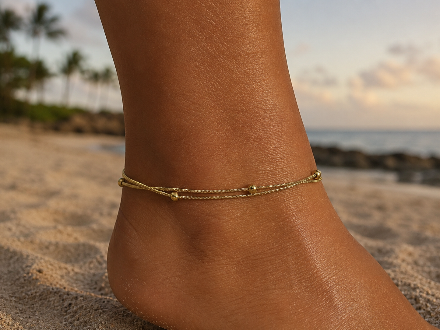 double row anklet made of colored beads and spirals 
