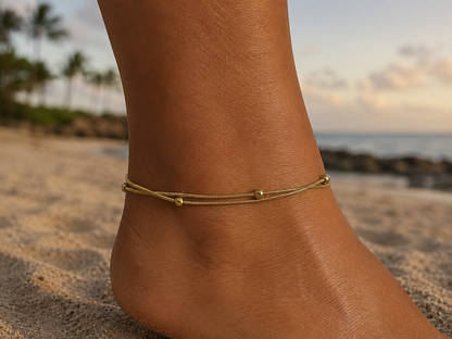 double row anklet made of colored beads and spirals 
