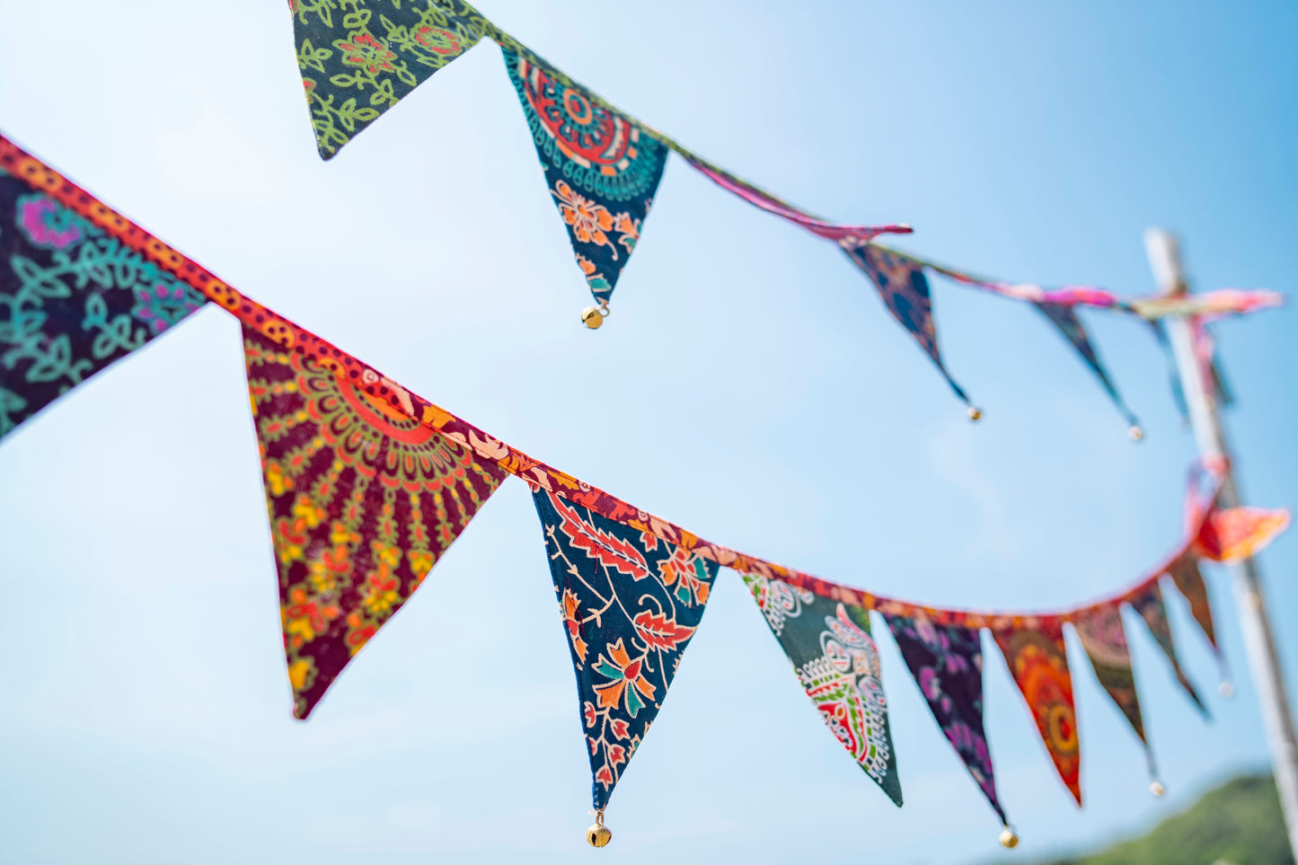 Bunting made of colorful flags with bells