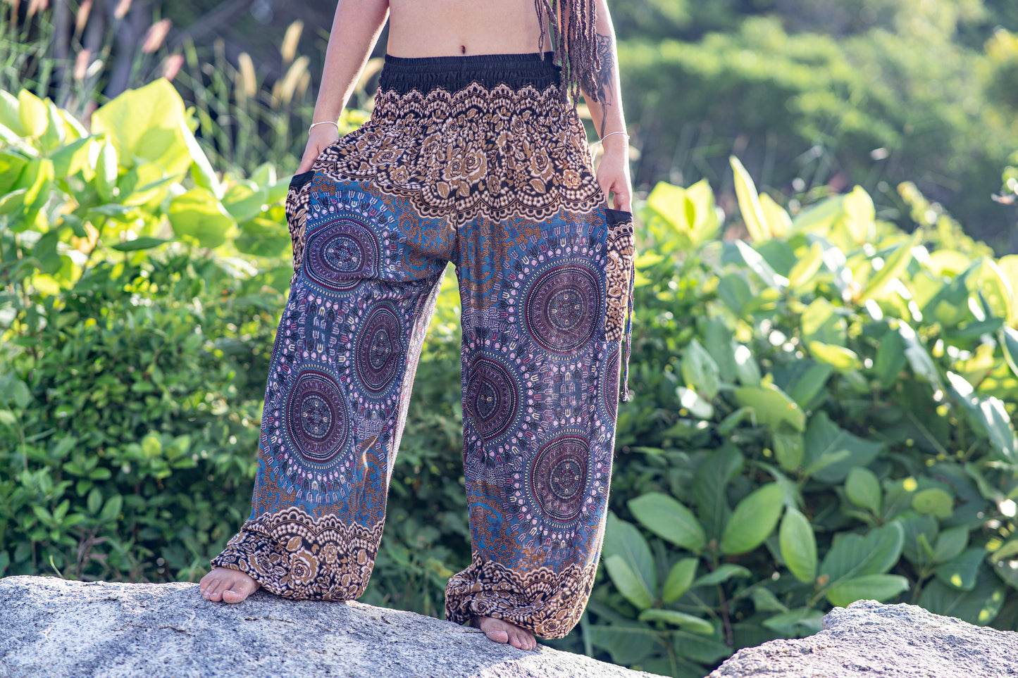 Airy harem pants with a mandala pattern in purple