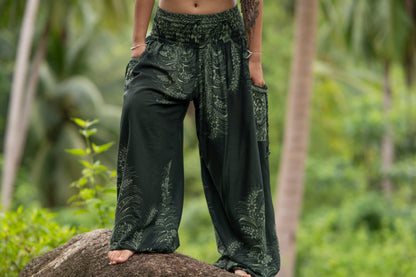 Dark green patterned harem pants with pockets in black