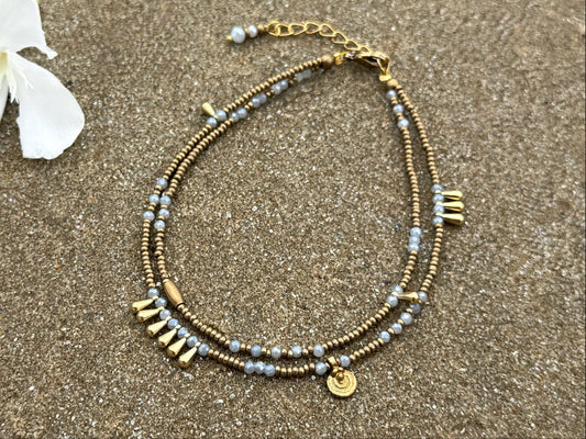 double row anklet made of colored beads and spirals 