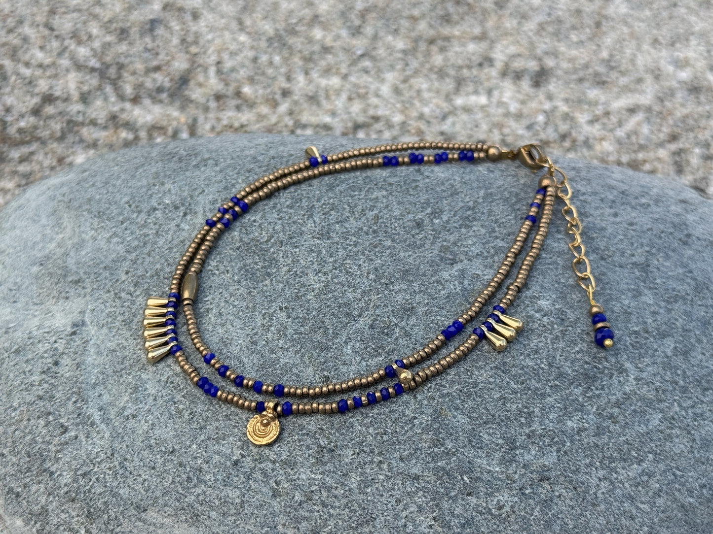double row anklet made of colored beads and spirals 