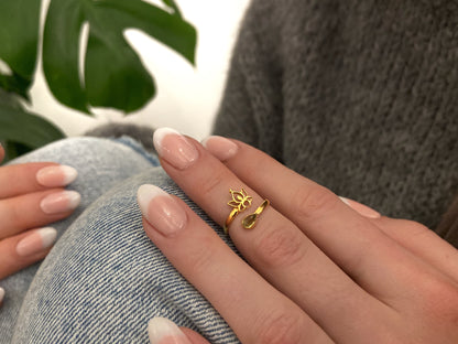 Gold plated toe ring with stone and small flower 