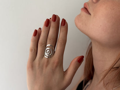playful ring decorated with silver dots