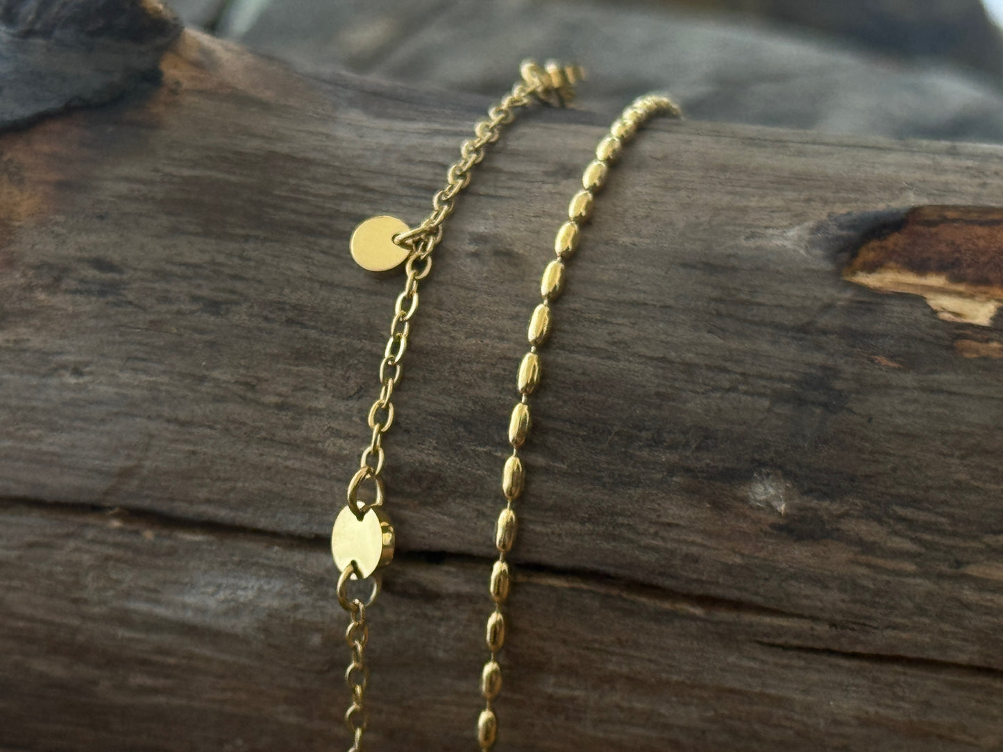 double row anklet made of colored beads and spirals 