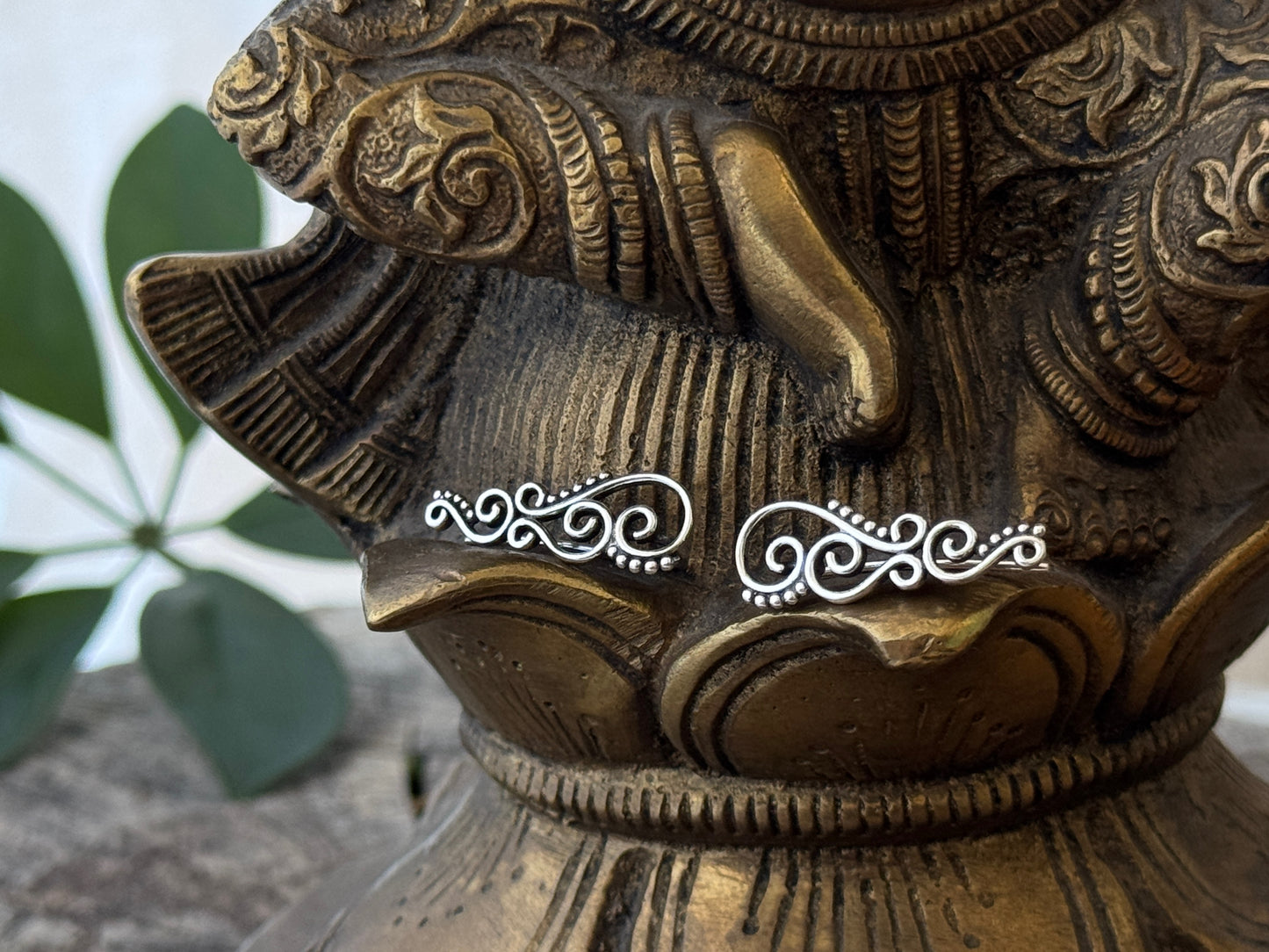 Earclimber earrings with spirals and dots made of silver 