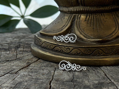 Earclimber earrings with spirals and dots made of silver 