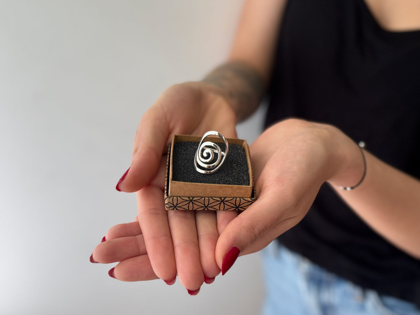 playful ring decorated with silver dots