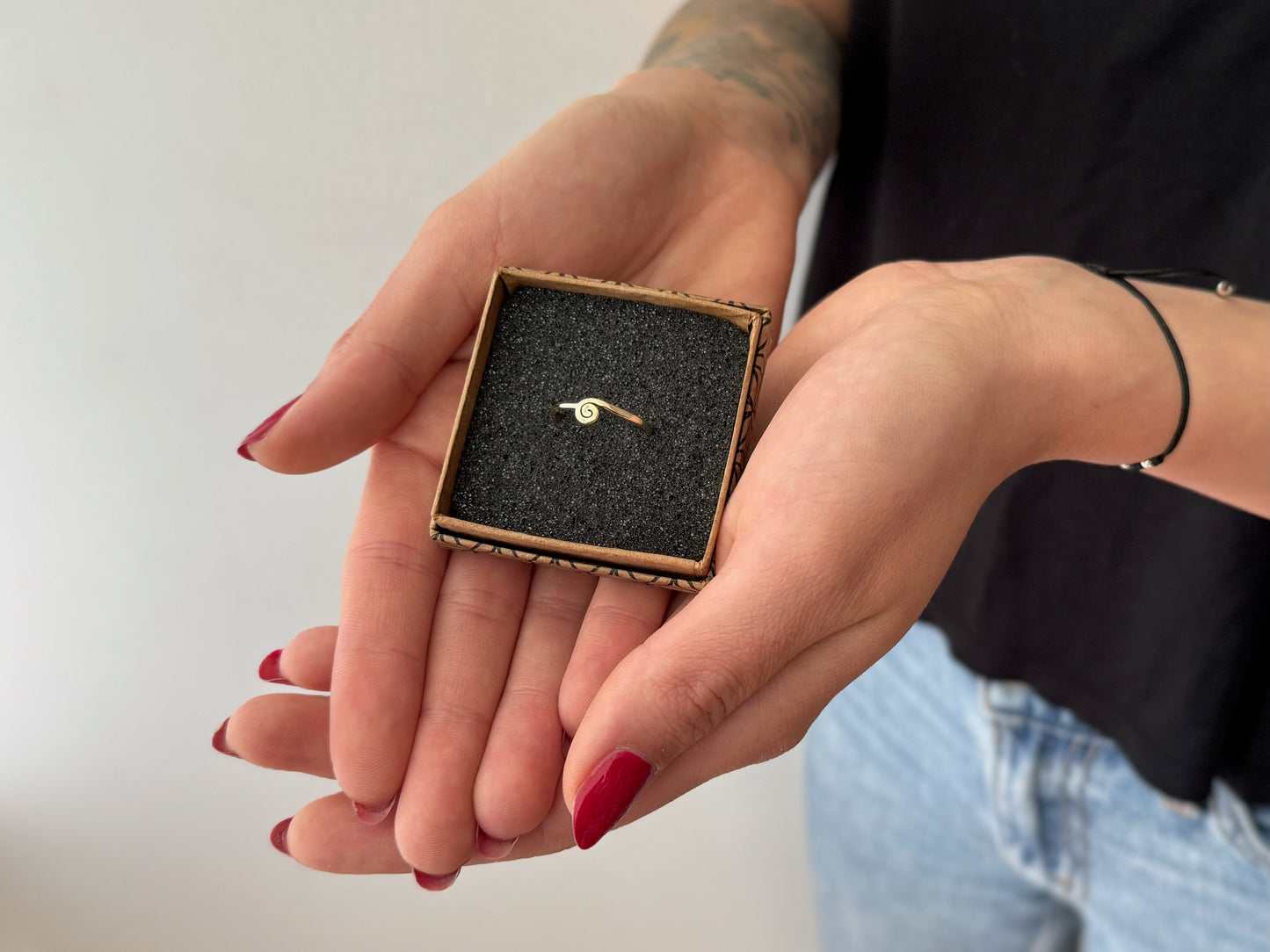 Brass ring with teardrop-shaped turquoise stone 