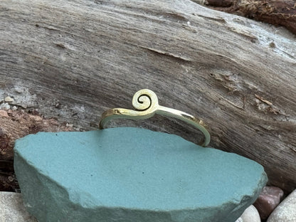 Brass ring with teardrop-shaped turquoise stone 