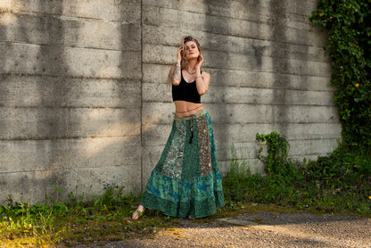 long colorful patterned patchwork skirt in green and turquoise tones 