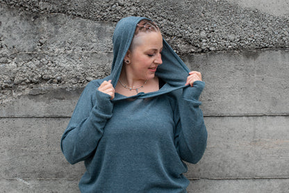 PLUS SIZE, long, plain knitted sweater with a large hood and thumbholes in blue 
