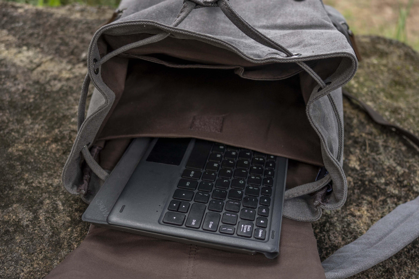 large casual canvas backpack with straps in gray 