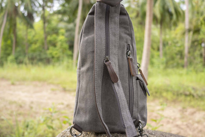 practical canvas shoulder bag with straps in gray 