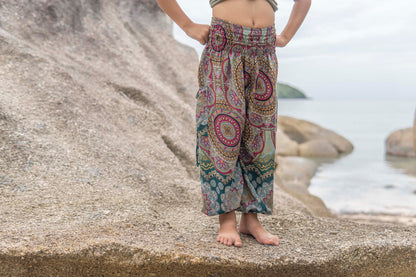 Airy harem pants with a colorful pattern for children 