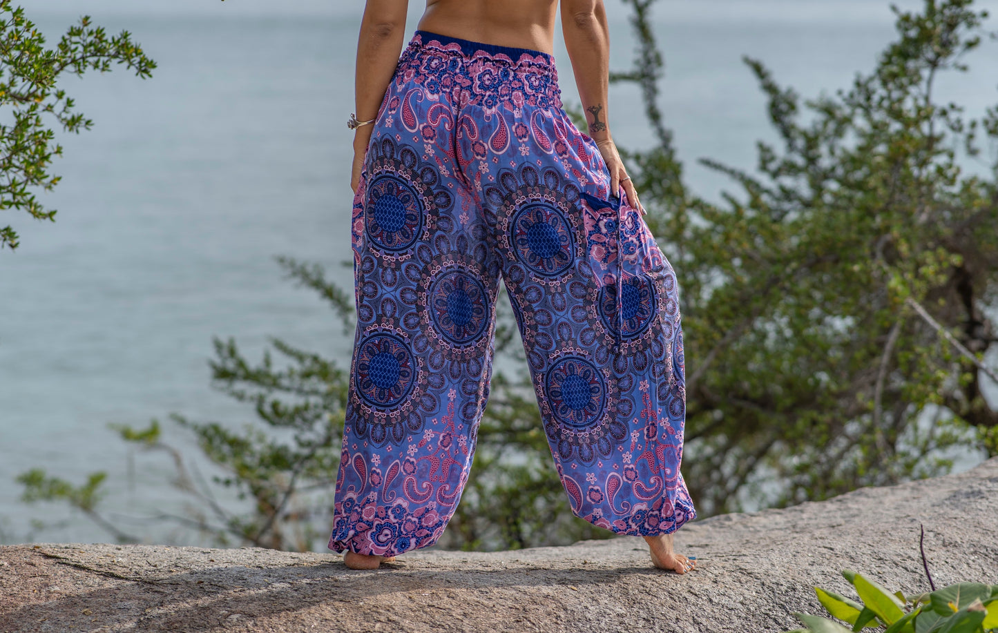 Harem pants with mandala pattern in pink purple