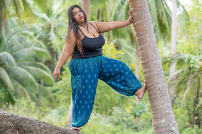 PLUS SIZE luftige gemusterte Pluderhose in türkis mit Taschen