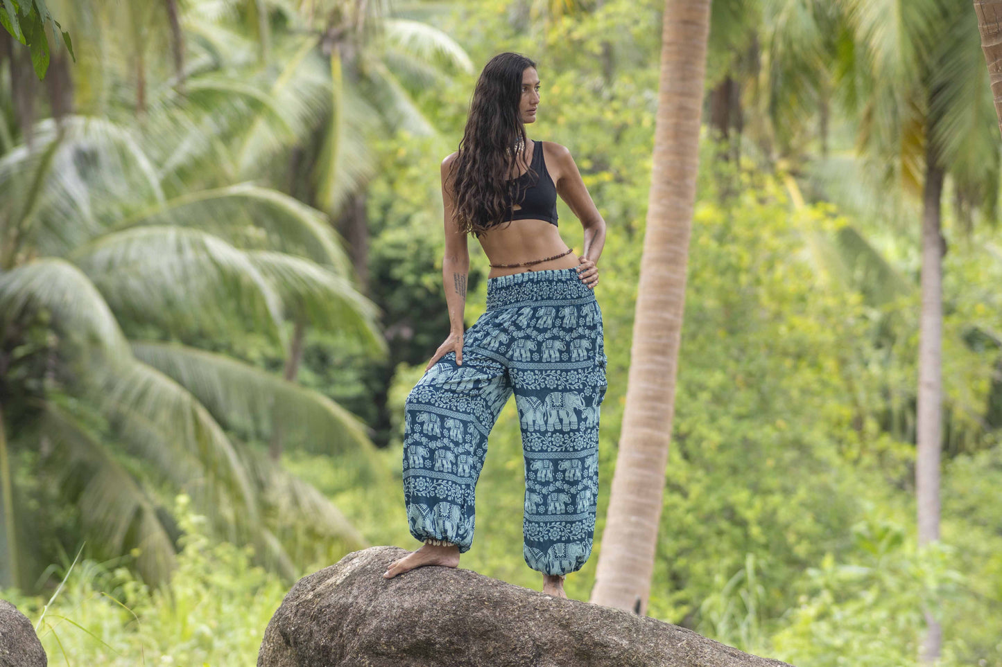 Airy harem pants with an elephant pattern in turquoise with pockets